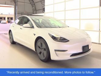 Used 2021 White Tesla Standard Range Plus image 1