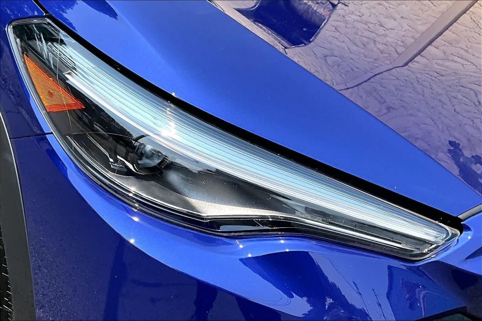 Used 2024 Blue Crush Metallic Toyota Hybrid XSE image 28