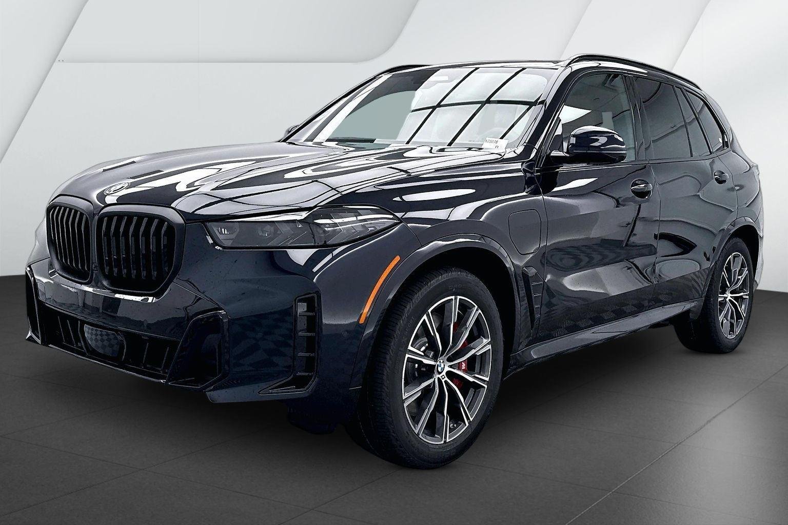 New 2026 Carbon Black Metallic BMW xDrive50e image 3