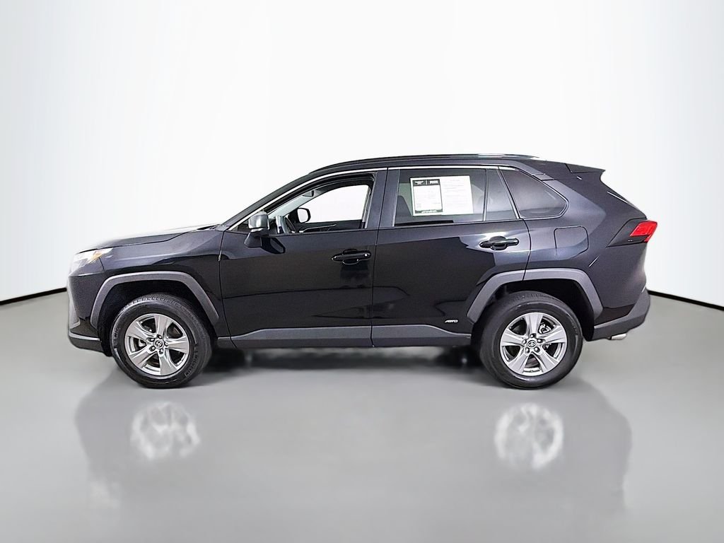 Used 2024 Midnight Black Metallic Toyota Hybrid LE image 4