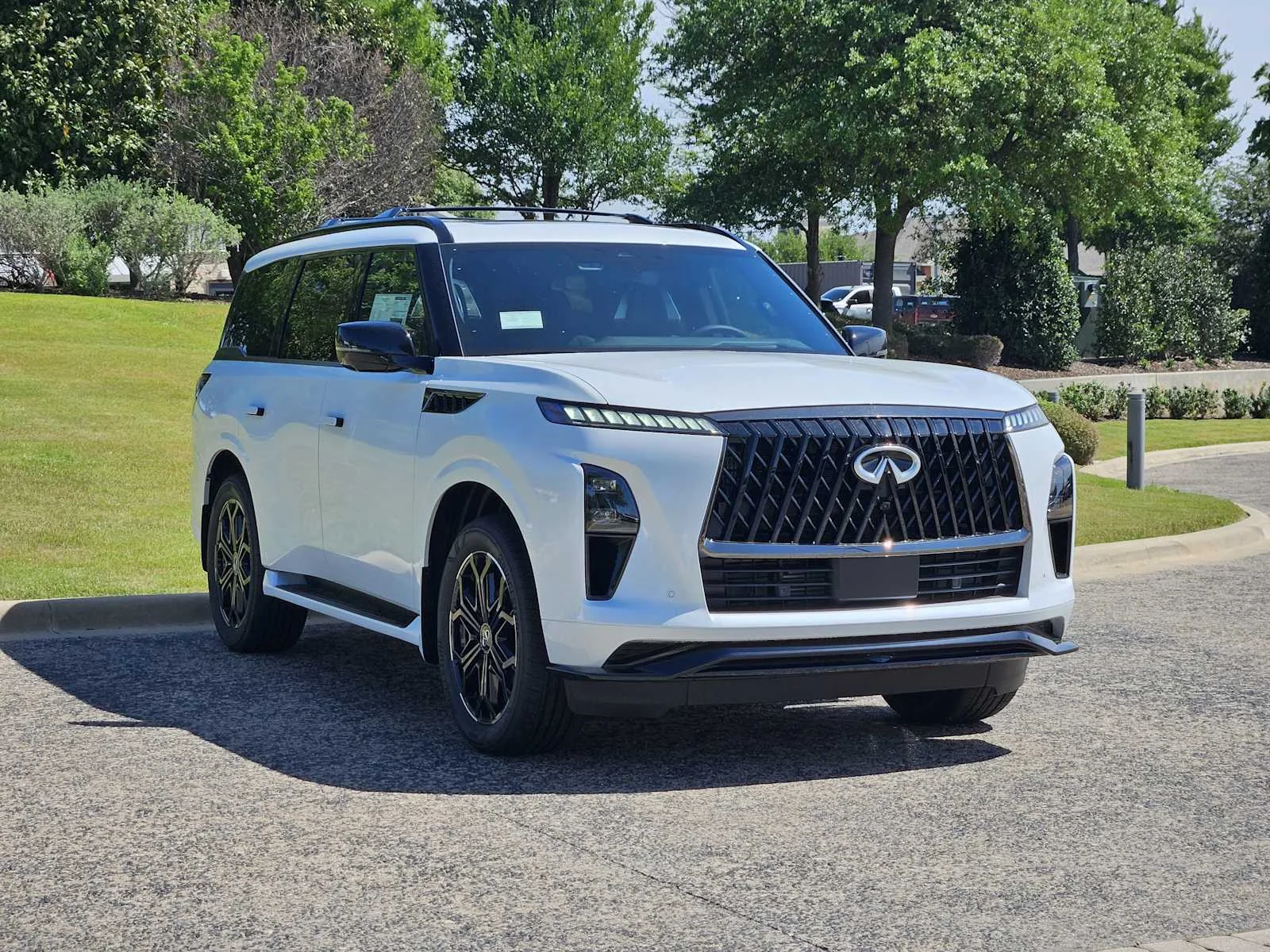 New 2026 RADIANT WHITE INFINITI Sport 4WD image 2
