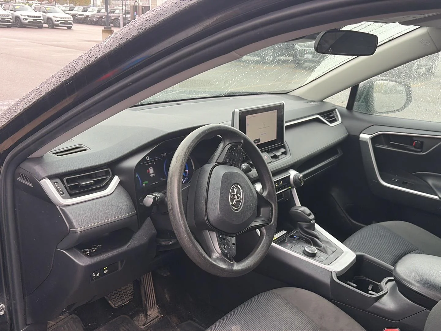 Used 2024 Midnight Black Metallic Toyota Hybrid LE image 5