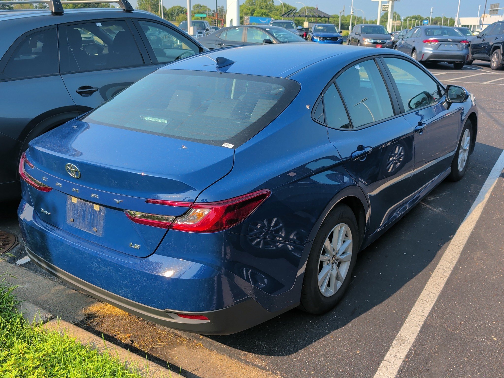 Used 2026 Reservoir Blue Toyota LE image 4