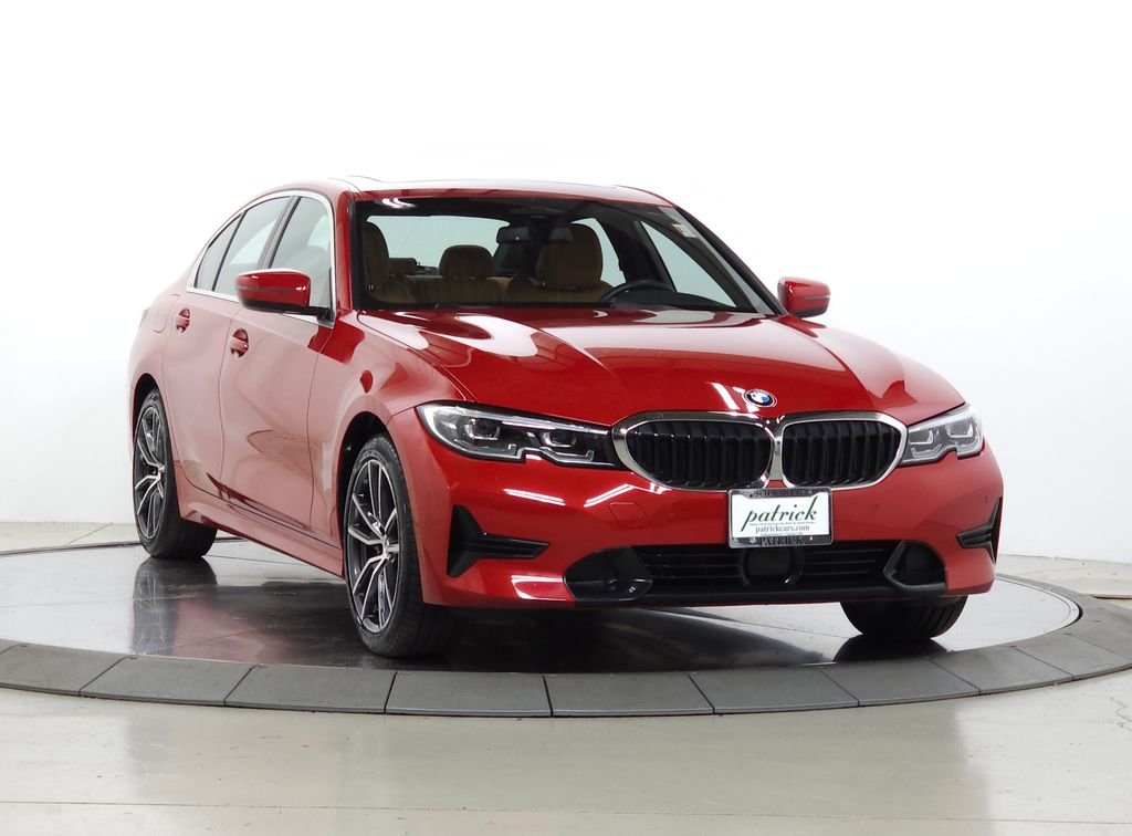 Used 2021 Melbourne Red Metallic BMW 330i xDrive image 1
