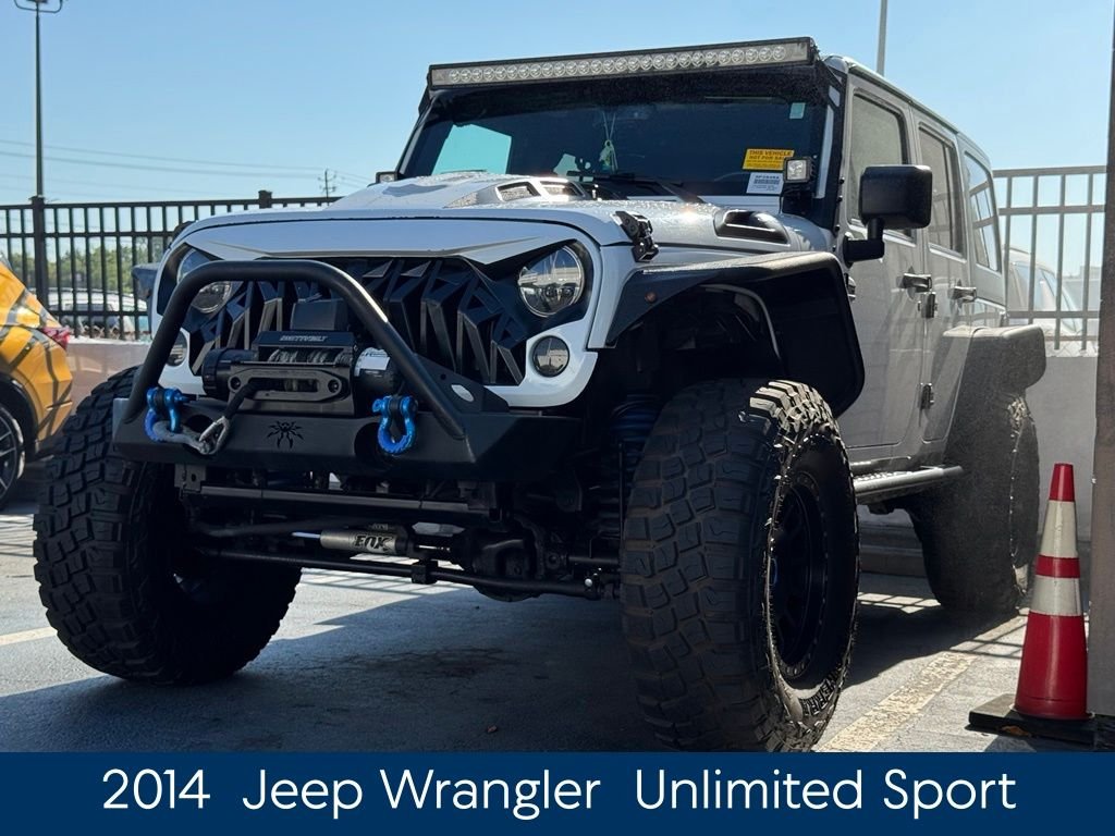 Used 2014 White Jeep Unlimited Sport image 3