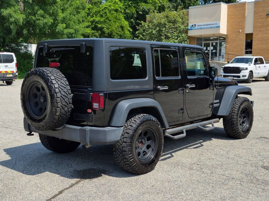 Used 2016 Black Jeep Unlimited Sport image 3