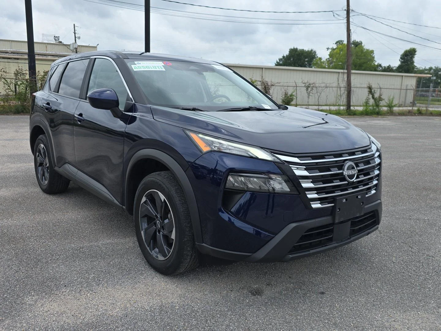 Used 2025 Deep Ocean Blue Pearl Nissan SV image 1