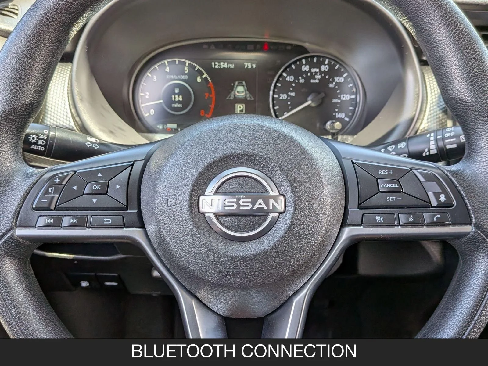 Used 2023 Electric Blue Metallic/Super Black Nissan SV image 12