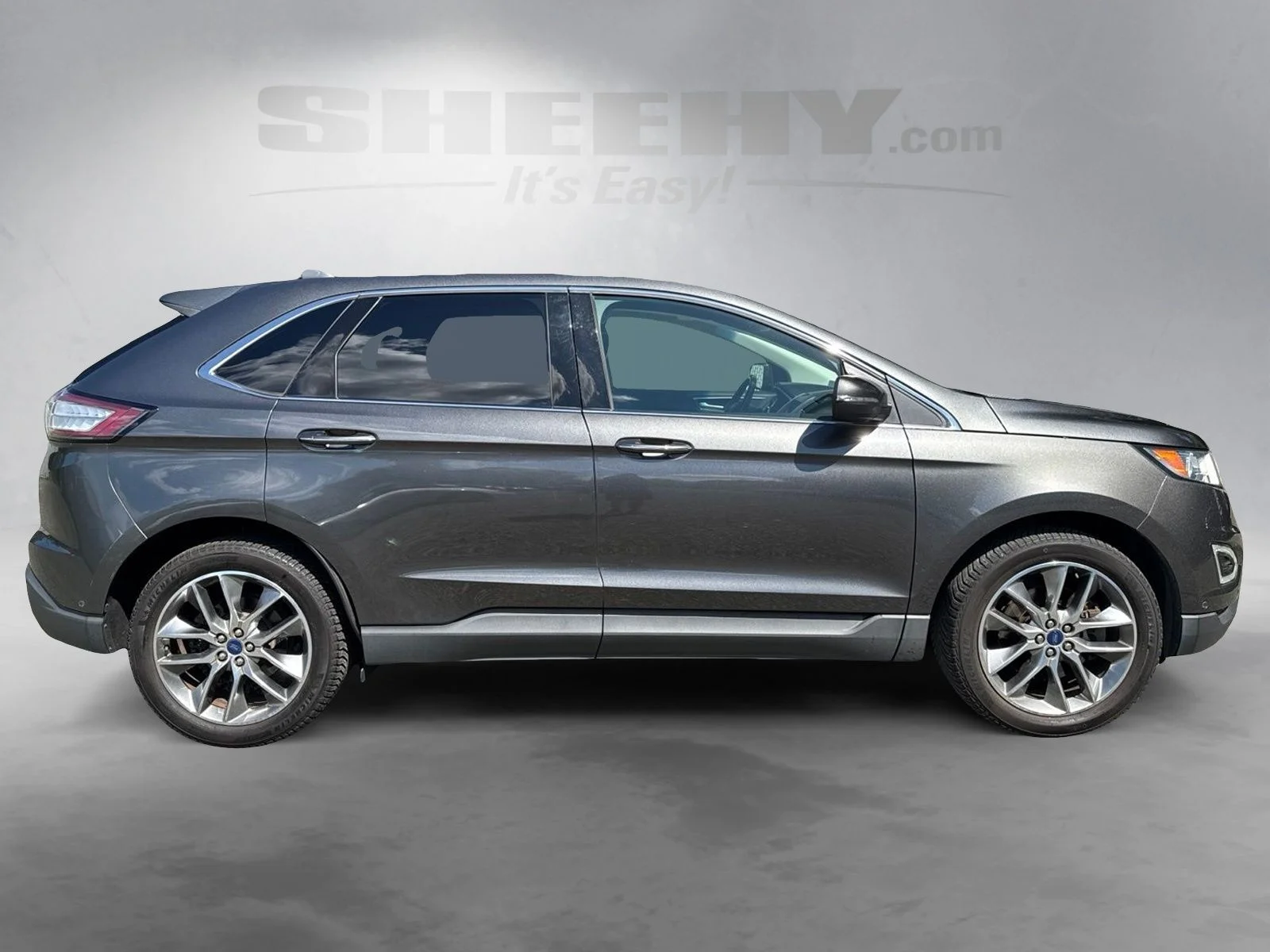 Used 2016 Magnetic Metallic Ford Titanium image 10
