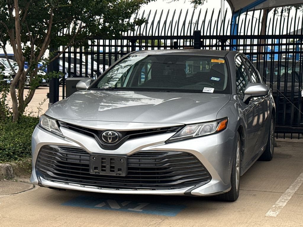 Used 2019 Celestial Silver Metallic Toyota LE image 1