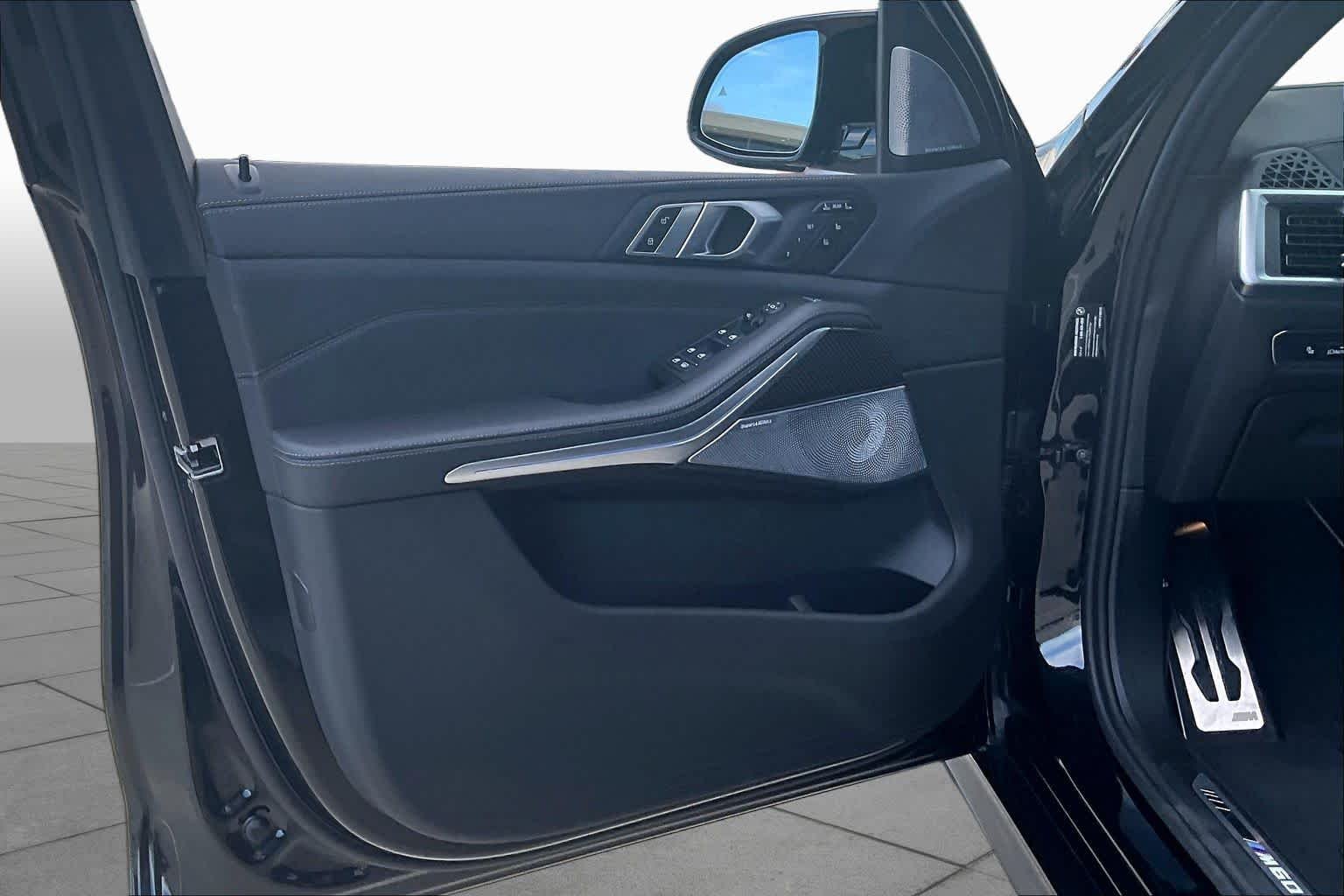 Used 2026 Black Sapphire Metallic BMW M60i image 24