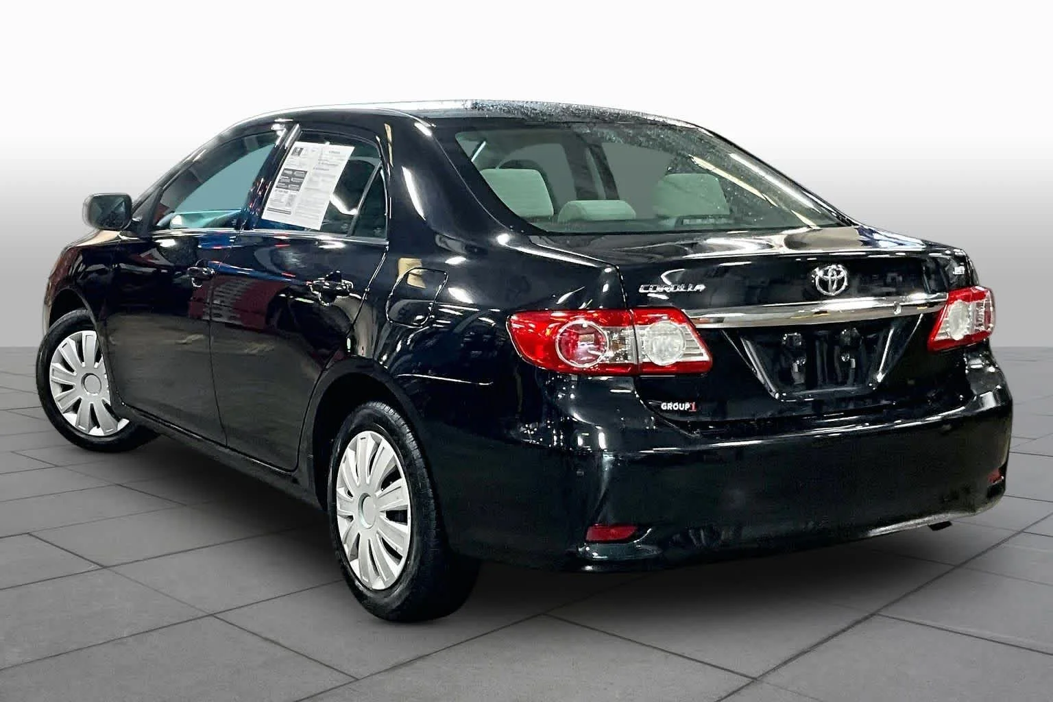 Used 2013 Black Sand Pearl Toyota LE image 12