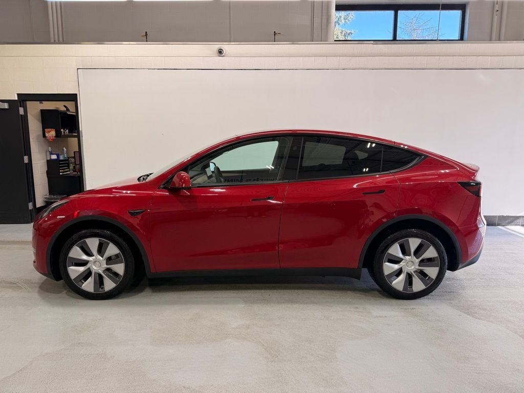 Used 2024 Tesla Model Y Long Range with VIN 7SAYGDEE2RA216148 for sale in Golden Valley, MN