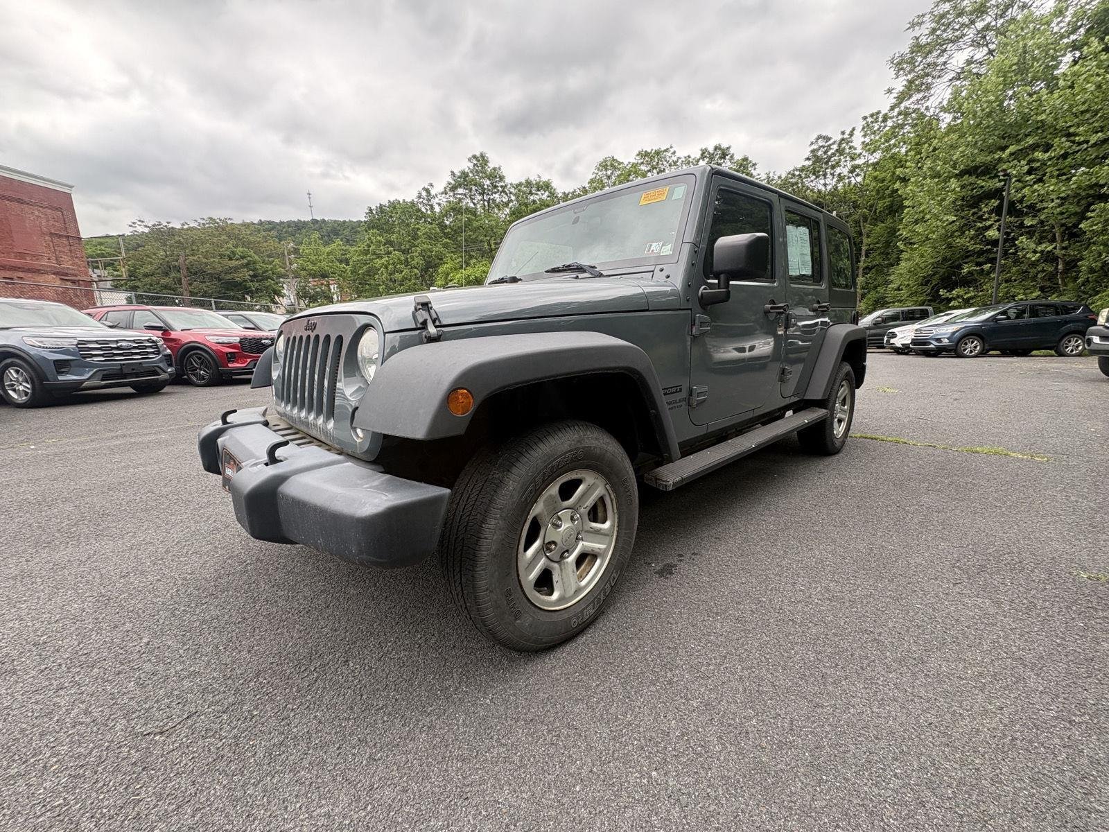 Used 2014 Anvil Clearcoat Jeep Sport image 3