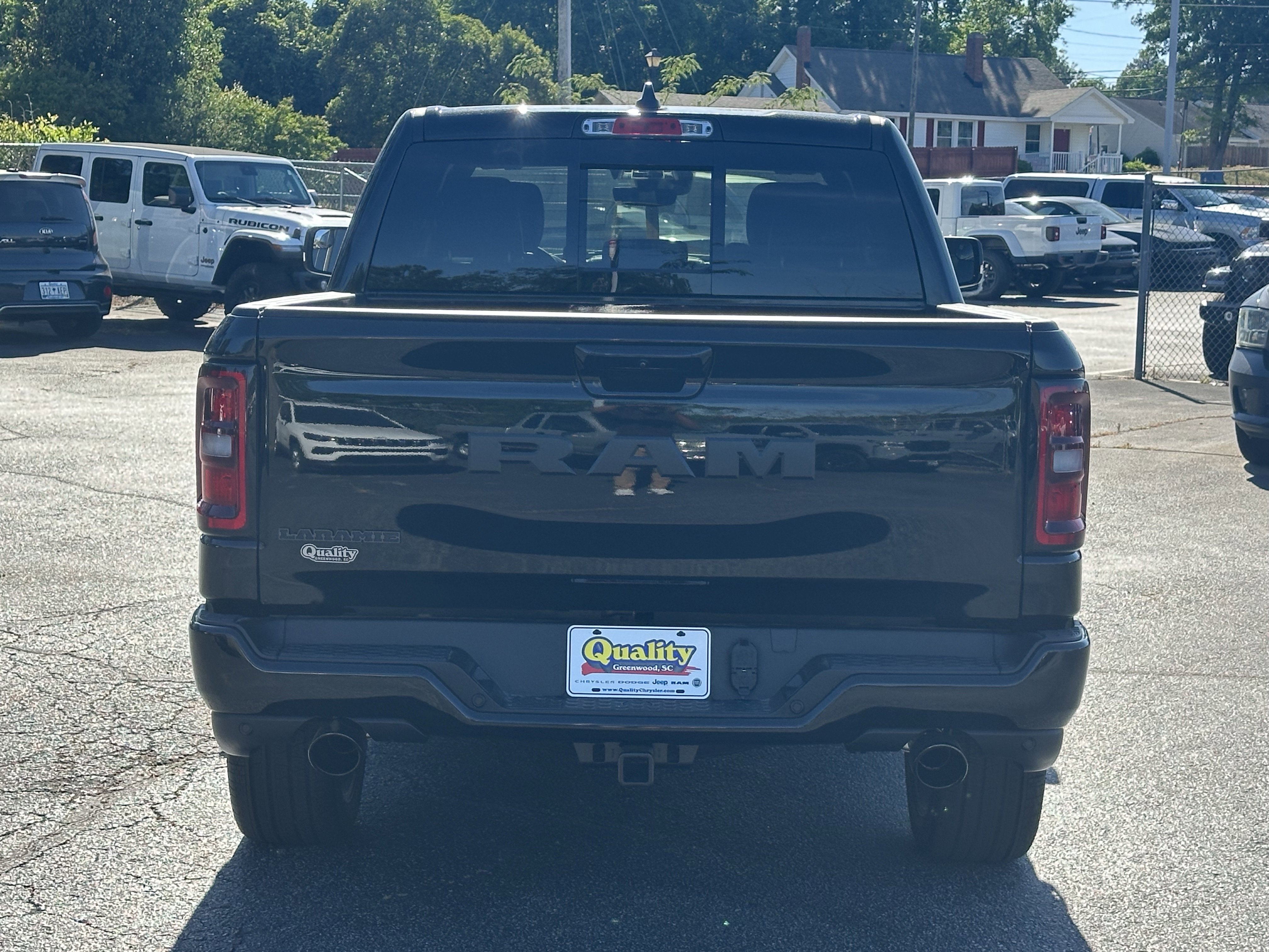 New 2026 Diamond Black Crystal Pearl-Coat Exterior Paint RAM Laramie image 7