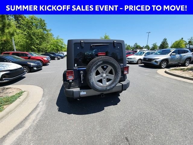 Used 2013 Blue Jeep Unlimited Sport image 13