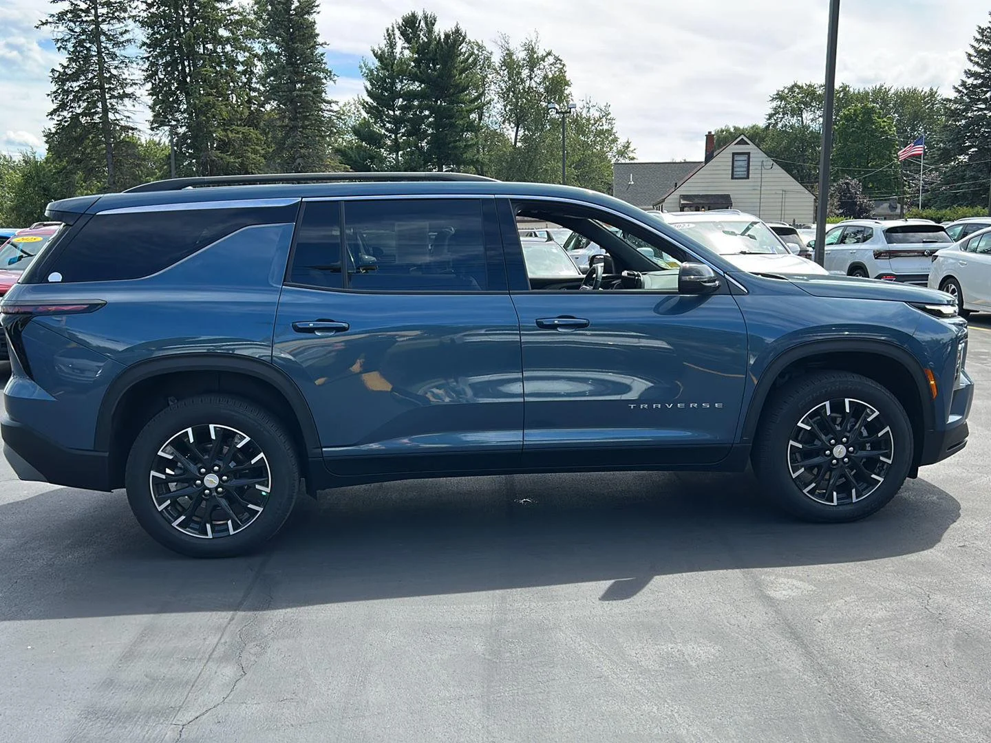 Used 2025 Lakeshore Blue Metallic Chevrolet AWD LT image 8