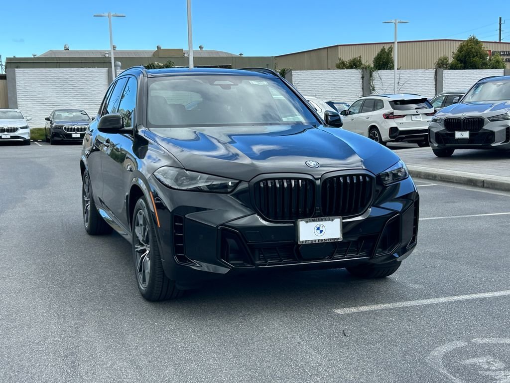 New 2026 Black Sapphire Metallic BMW xDrive50e image 7