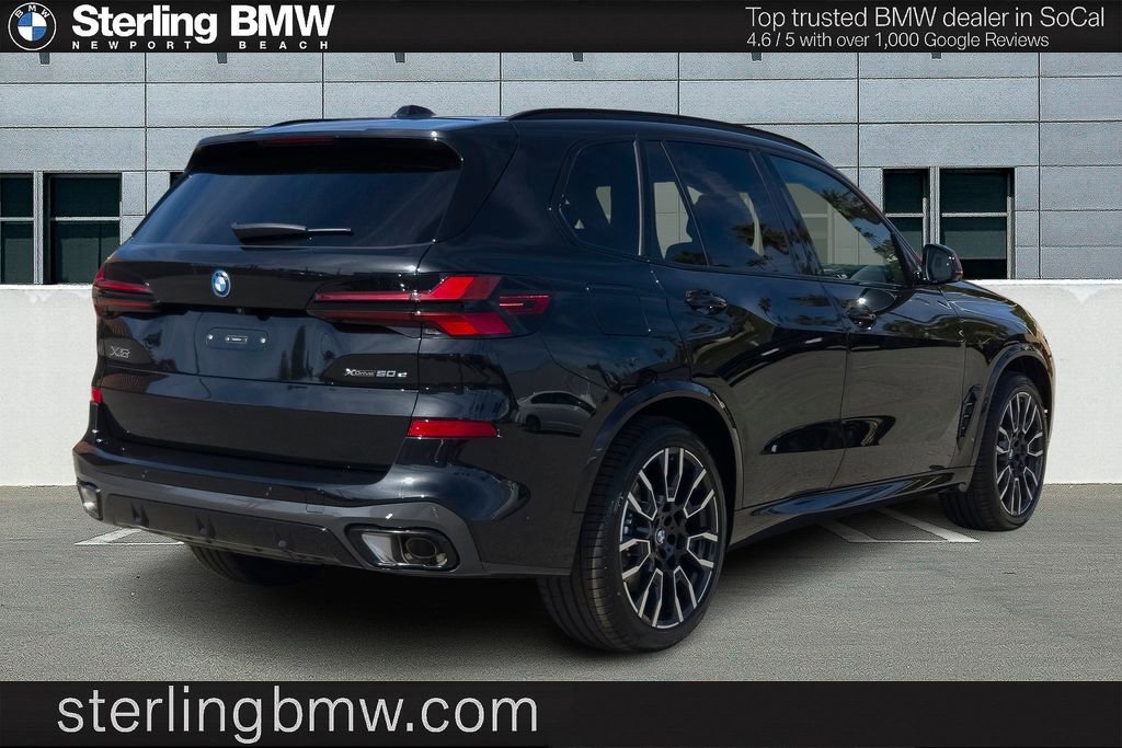 New 2026 Black Sapphire Metallic BMW xDrive50e image 16