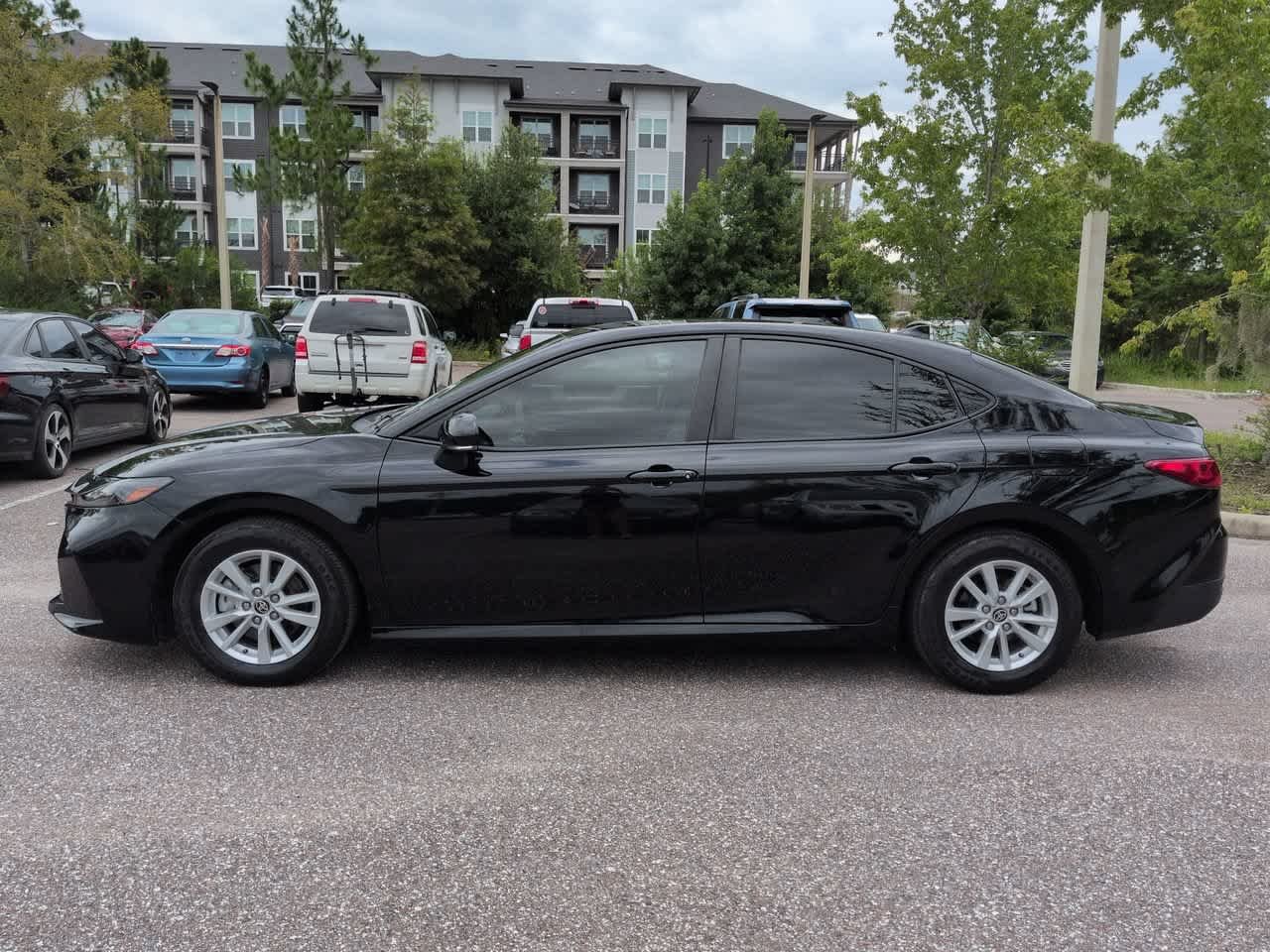 Used 2025 Midnight Black Metallic Toyota LE image 3