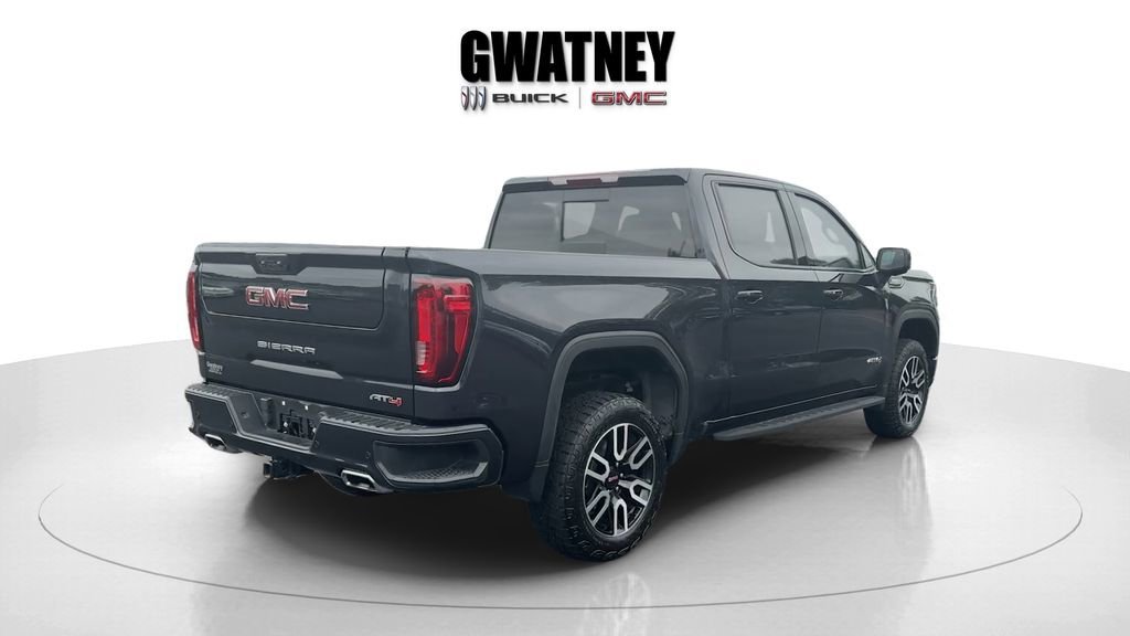 Used 2023 Titanium Rush Metallic GMC AT4 image 3