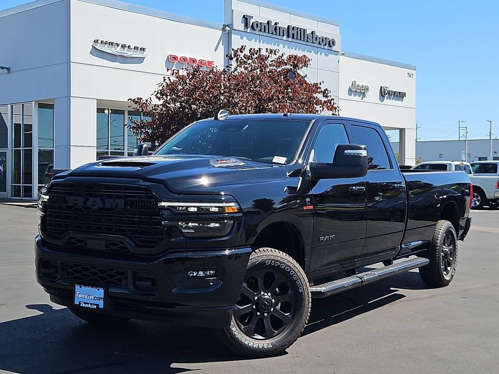 New 2026 Diamond Black Crystal Pearl-Coat Exterior Paint RAM Laramie image 2
