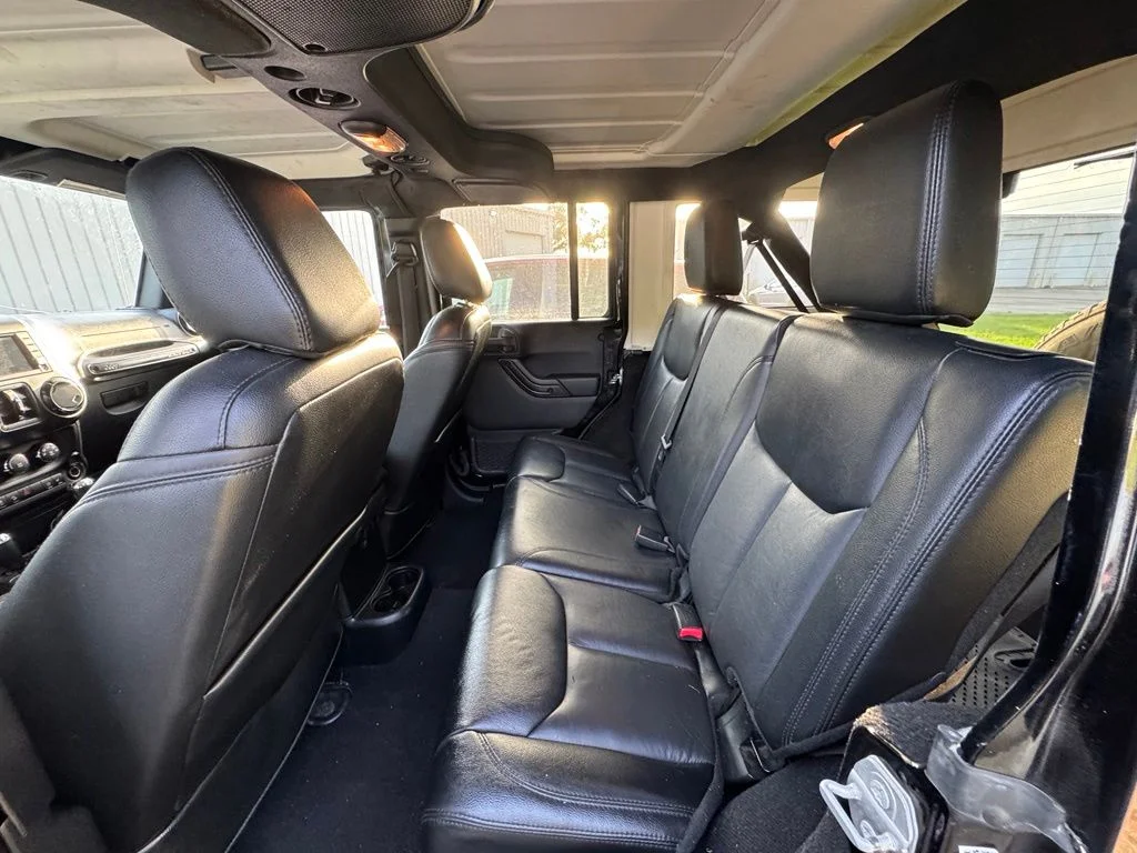 Used 2017 Black Jeep Unlimited Sahara image 10