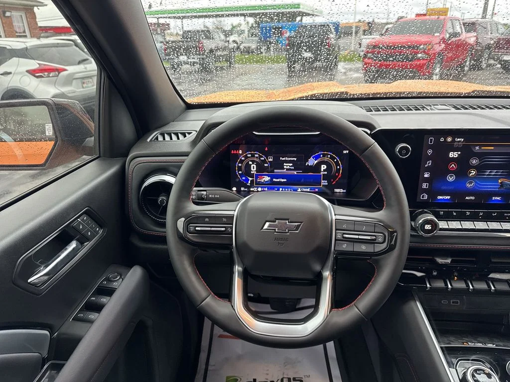 Used 2025 Orange Chevrolet Z71 image 14