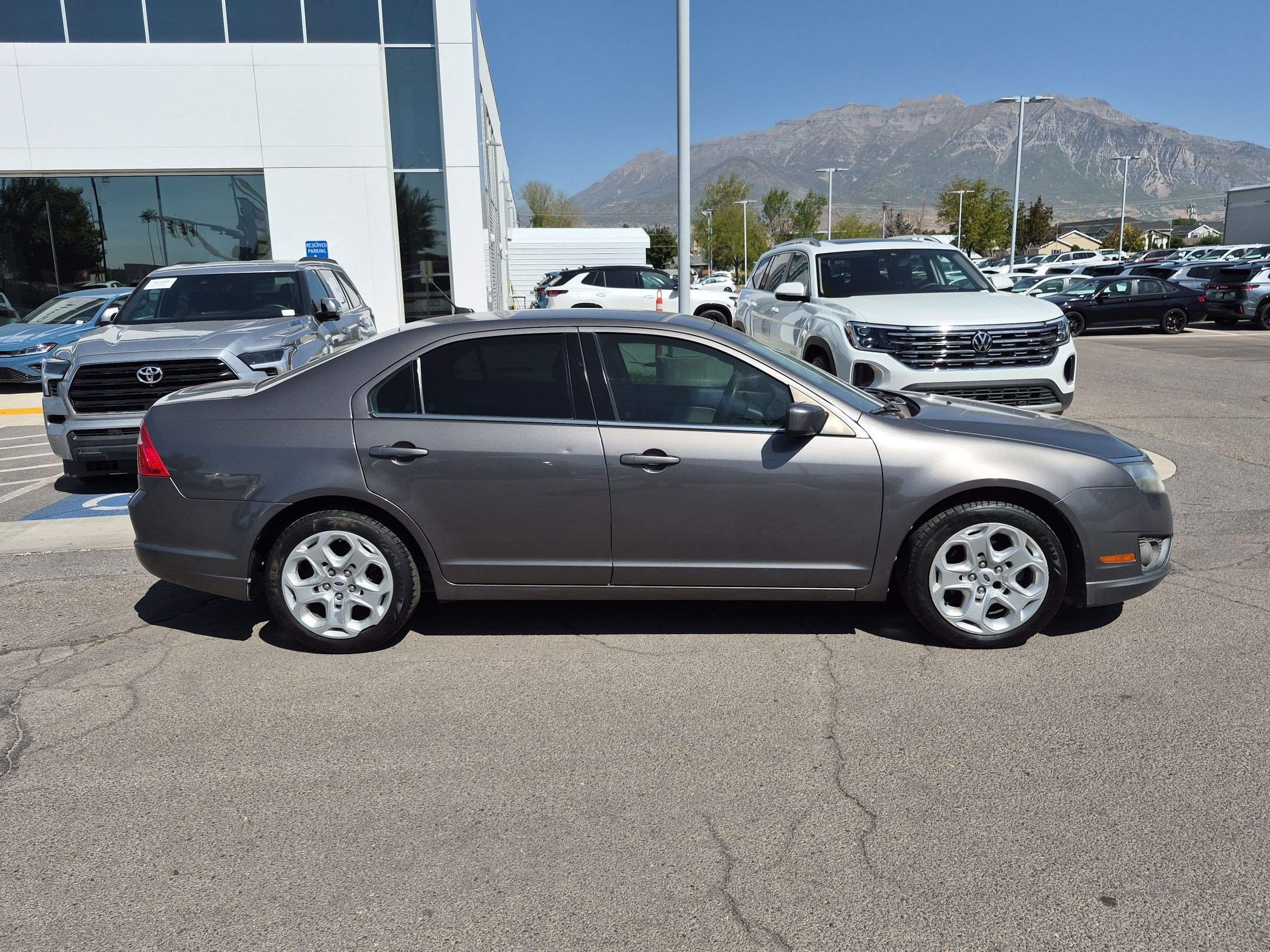 Used 2011 Sterling Gray Metallic Ford SE image 2