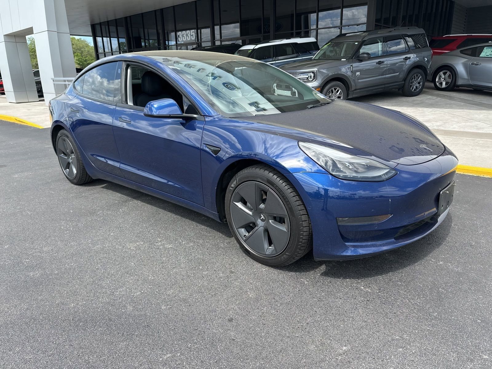Used 2021 Tesla Model 3 Base with VIN 5YJ3E1EA0MF099772 for sale in Spring Hill, FL