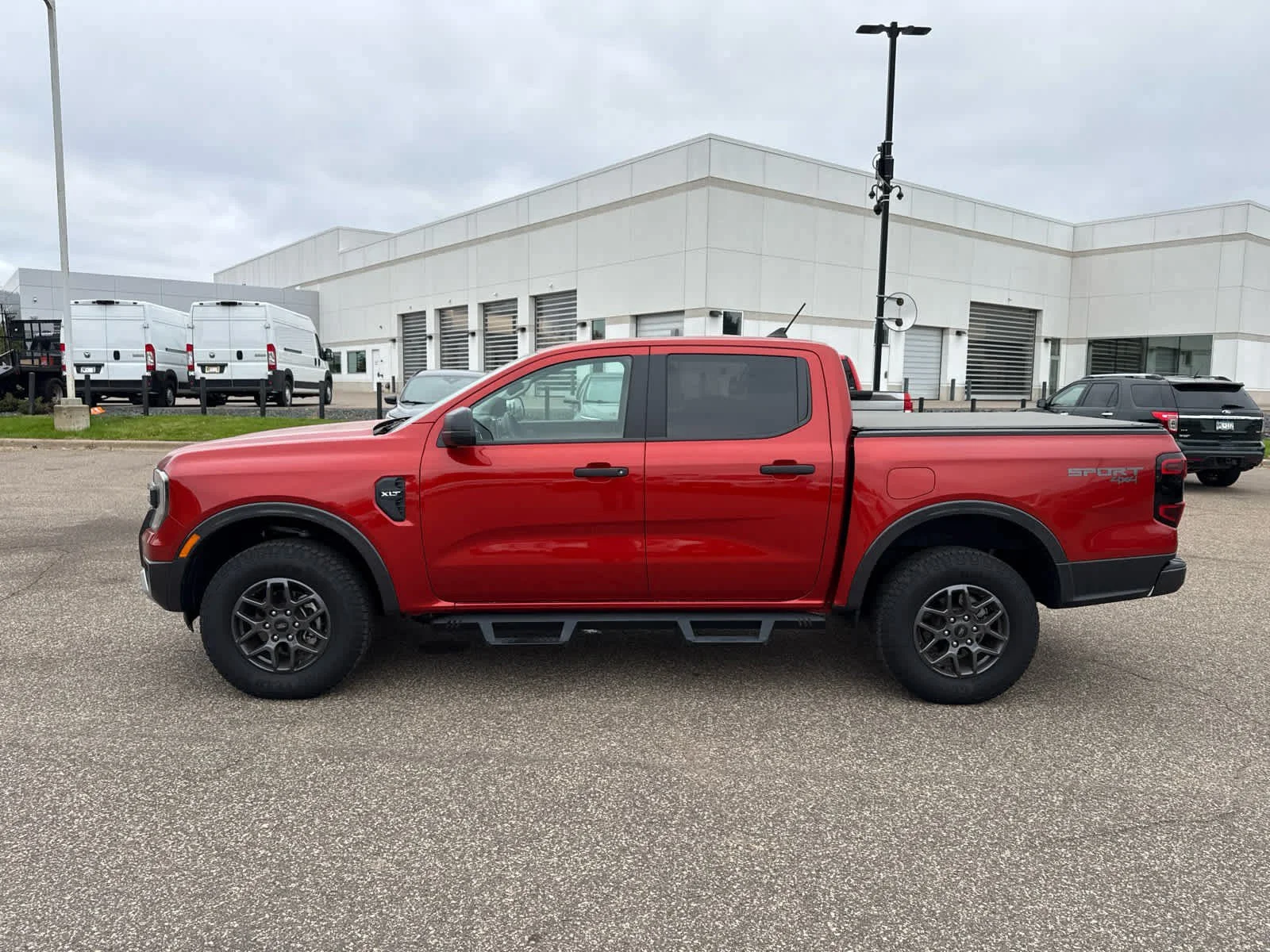 Used 2024 Hot Pepper Red Metallic Tinted Clearcoat Ford XLT image 4