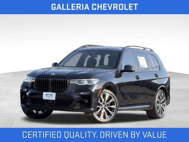 Used 2022 Black BMW M50i image 1