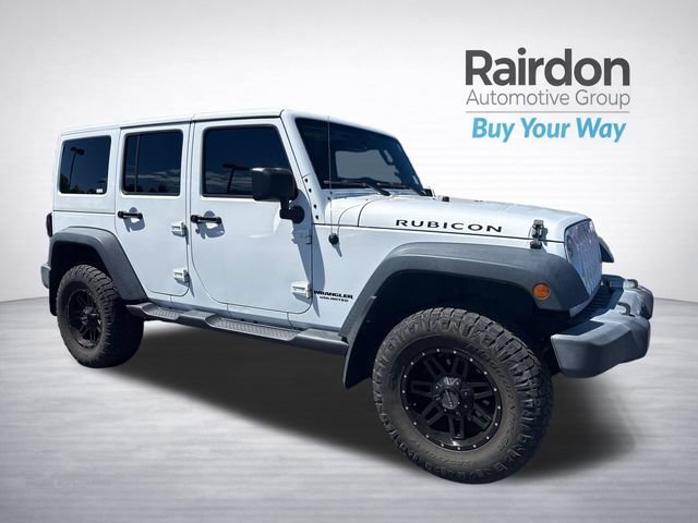 Used 2014 Bright White Clearcoat Jeep Rubicon image 1