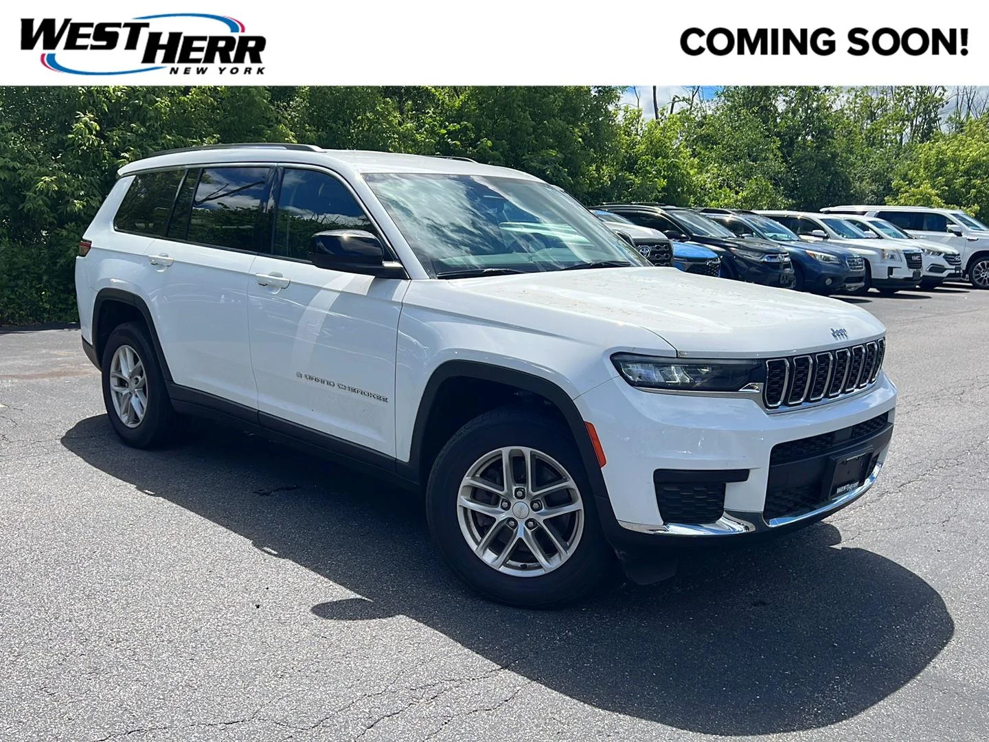 Used 2023 Bright White Clearcoat Jeep Laredo image 1