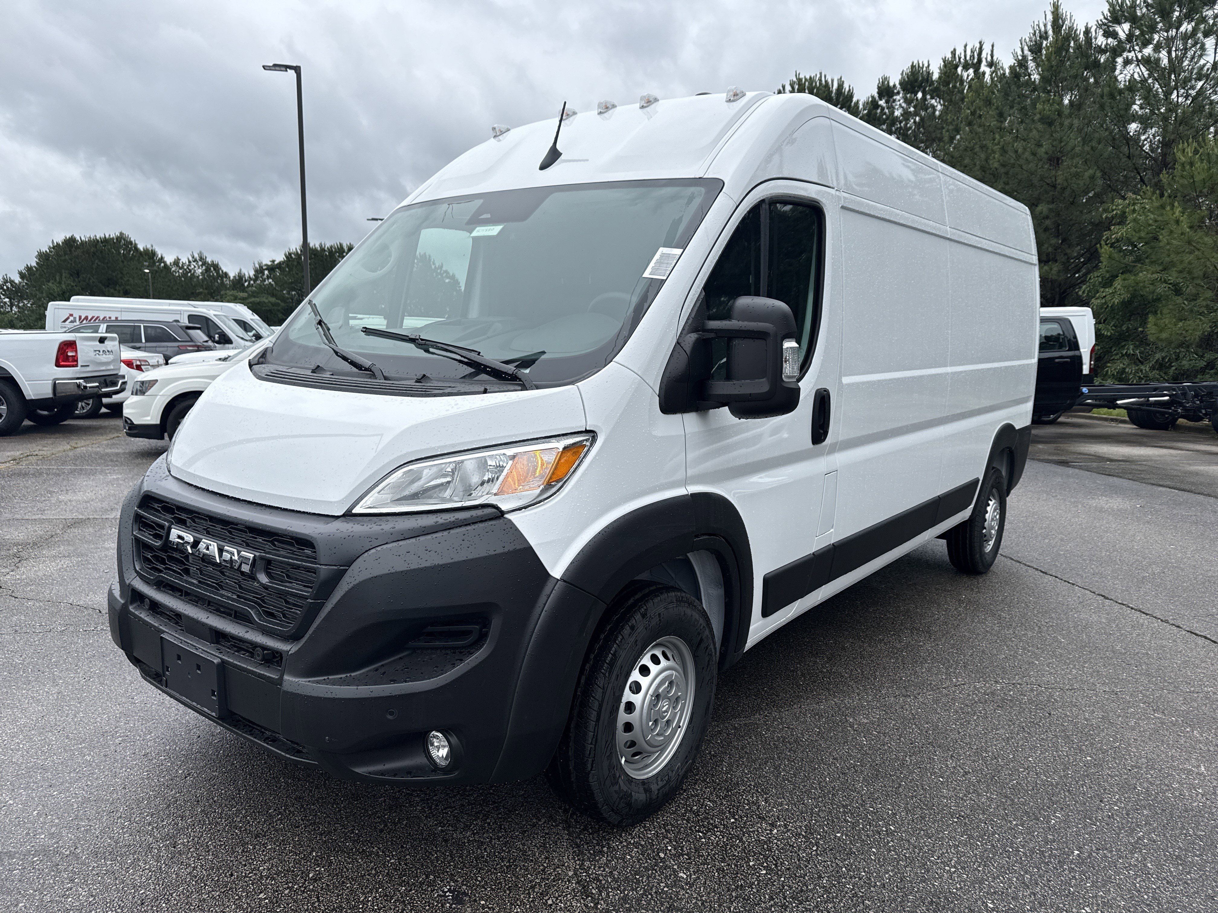 New 2026 Bright White Clearcoat RAM High Roof image 3