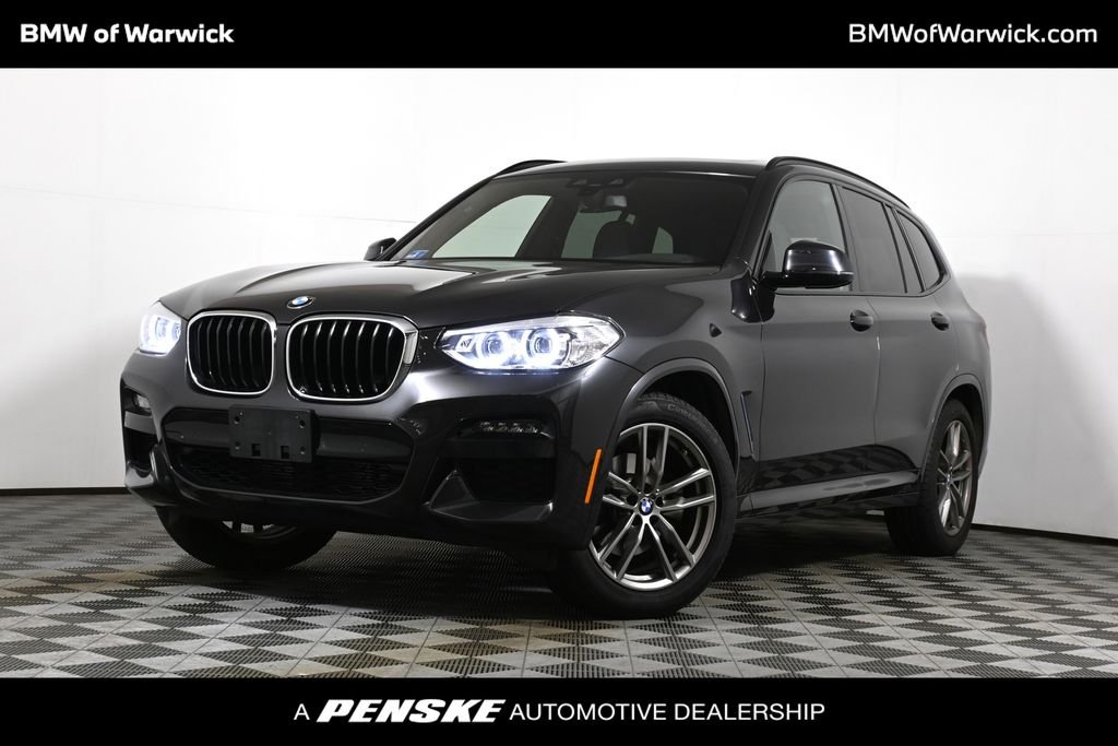 Used 2021 Gray BMW sDrive30i image 1
