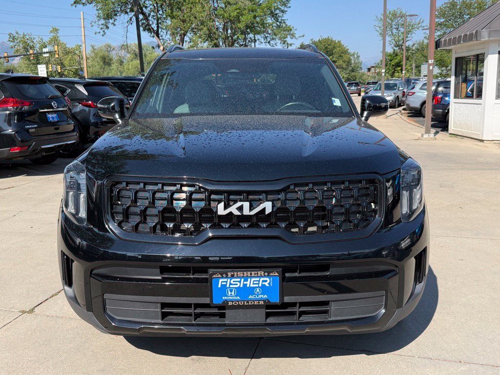 Used 2024 Ebony Black Kia EX X-Line image 9