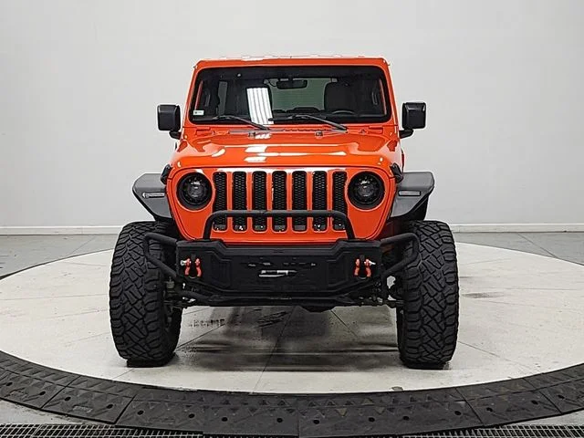 Used 2018 Orange Jeep Unlimited Sahara image 2