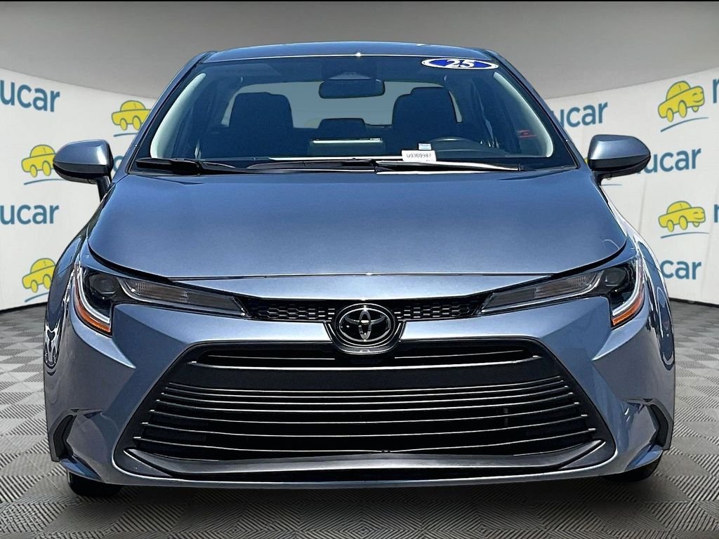 Certified Used 2025 Blue Toyota LE image 2