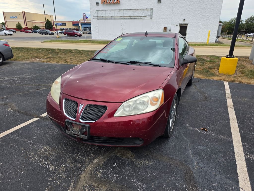 Used 2009 Performance Red Metallic Pontiac GT image 2