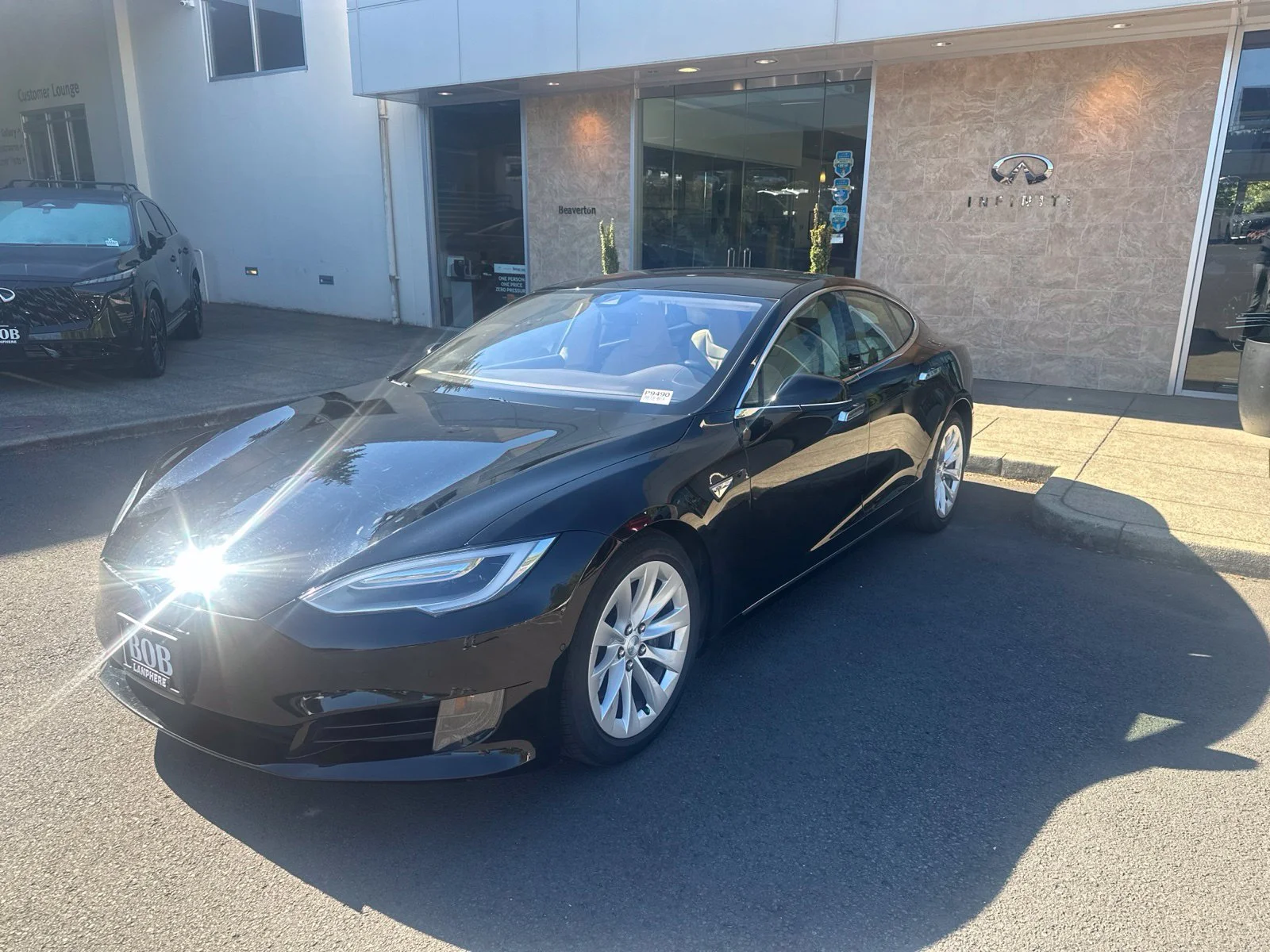 Used 2016 Obsidian Black Metallic Tesla  image 1