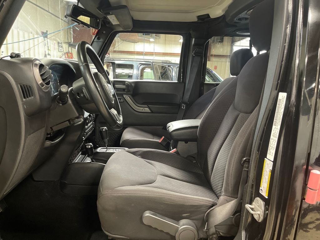 Used 2013 Black Jeep Unlimited Sport image 14