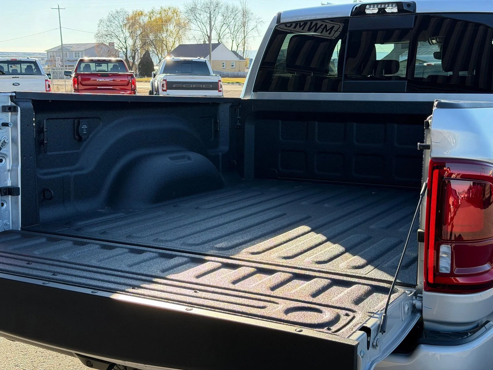 New 2026 Silver-Zynith Exterior Paint RAM Laramie image 9