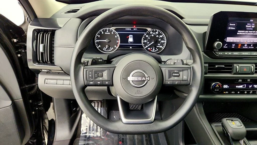 Used 2024 Super Black Nissan S 4WD image 13