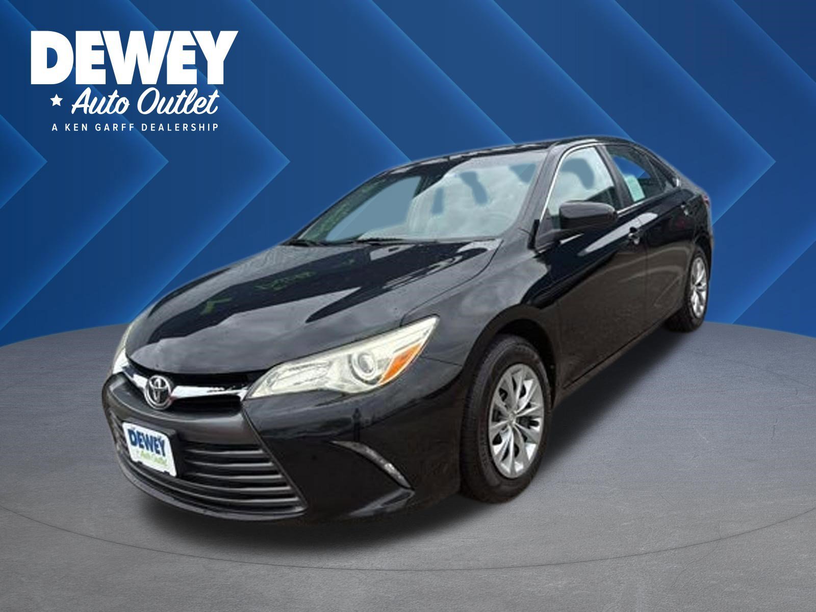 Used 2016 Midnight Black Metallic Toyota LE image 1