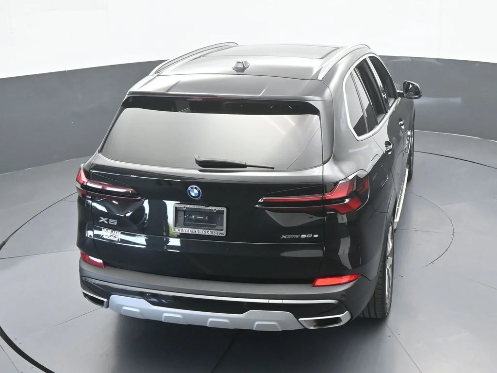 Used 2025 Black Sapphire Metallic BMW xDrive50e image 56