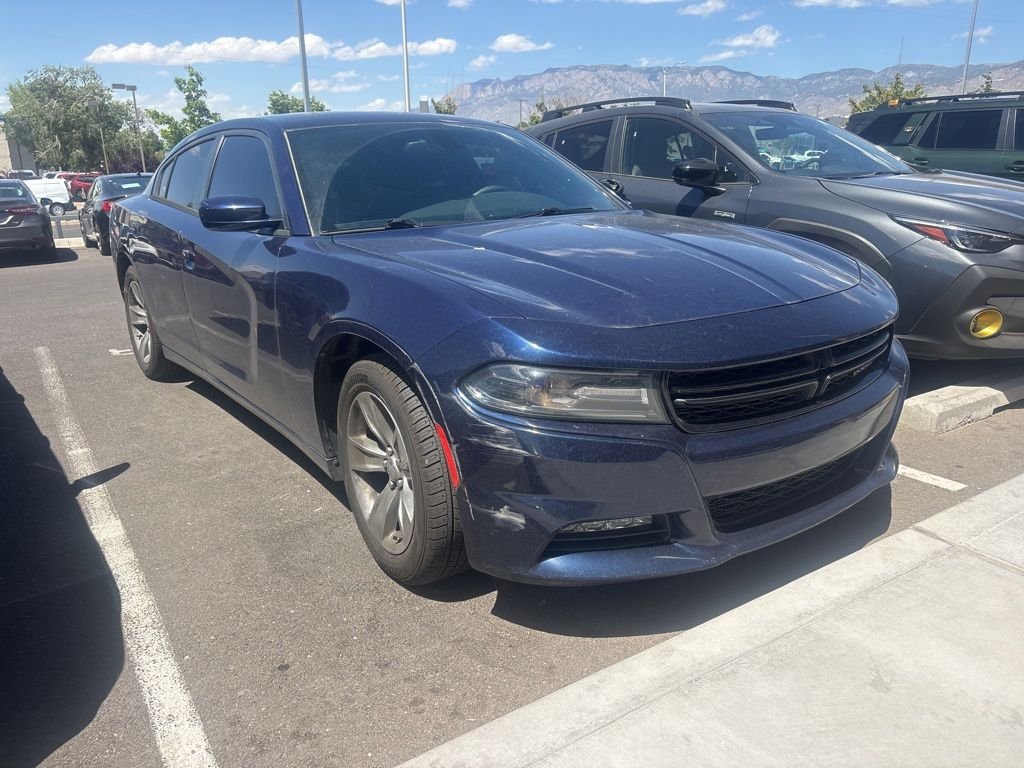 Used 2015 Blue Dodge SXT image 1