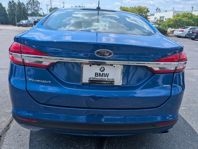 Used 2017 Lightning Blue Ford SE image 5