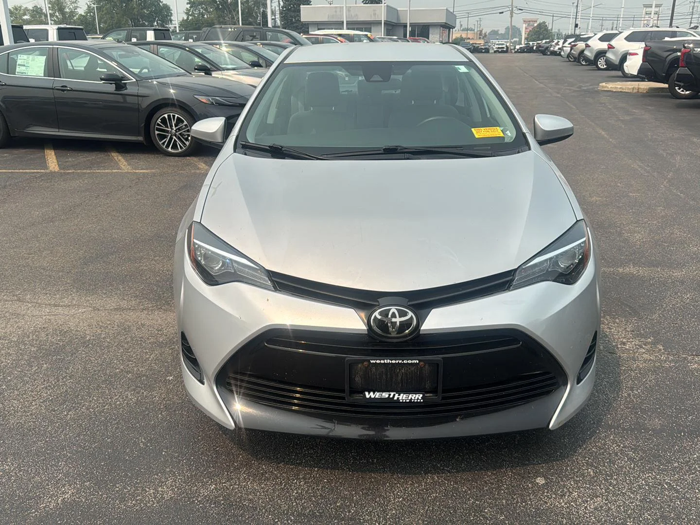 Used 2019 Classic Silver Metallic Toyota LE image 2