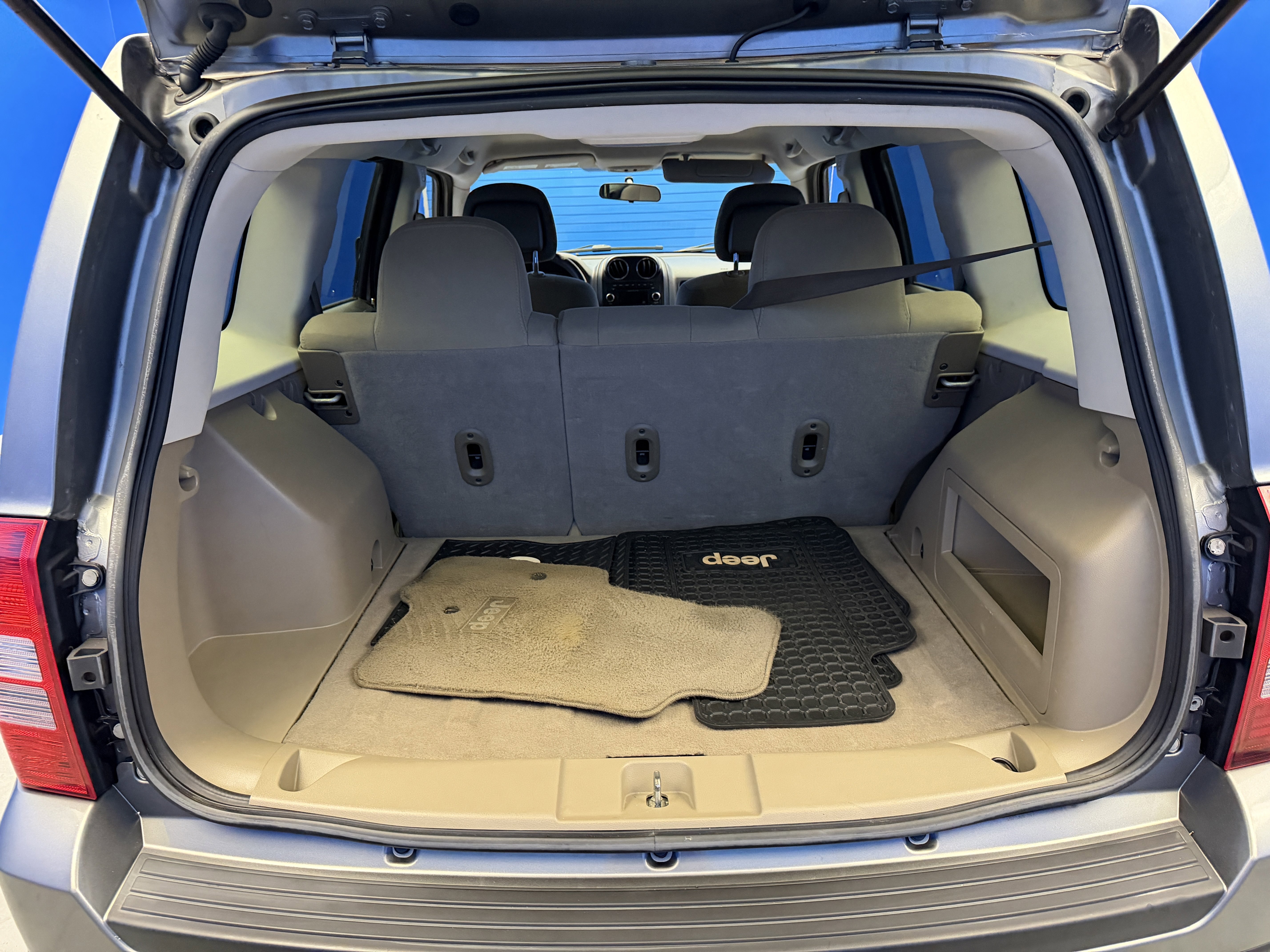 Used 2012 Mineral Gray Metallic Jeep Sport image 23